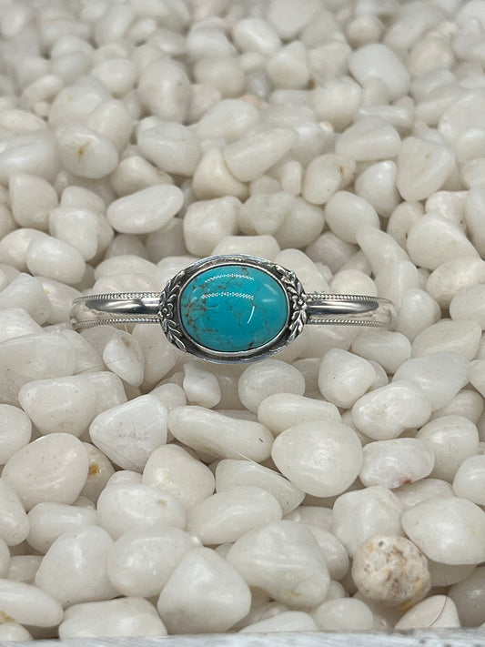 Kingman Turquoise Horizontal Oval Cuff w/Decorative Flower Vine